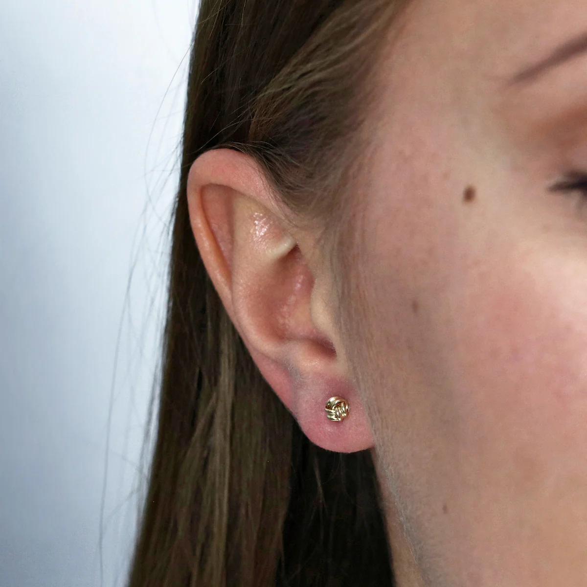 5mm Ribbon Knot Stud Earrings | 9K Solid Yellow Gold - Image 5