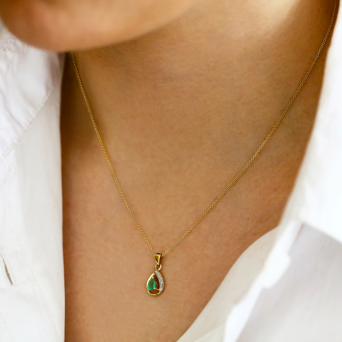 Bijou Collection 0.33ct Pear Emerald and Diamond Pendant | 9K Yellow Gold - Image 4