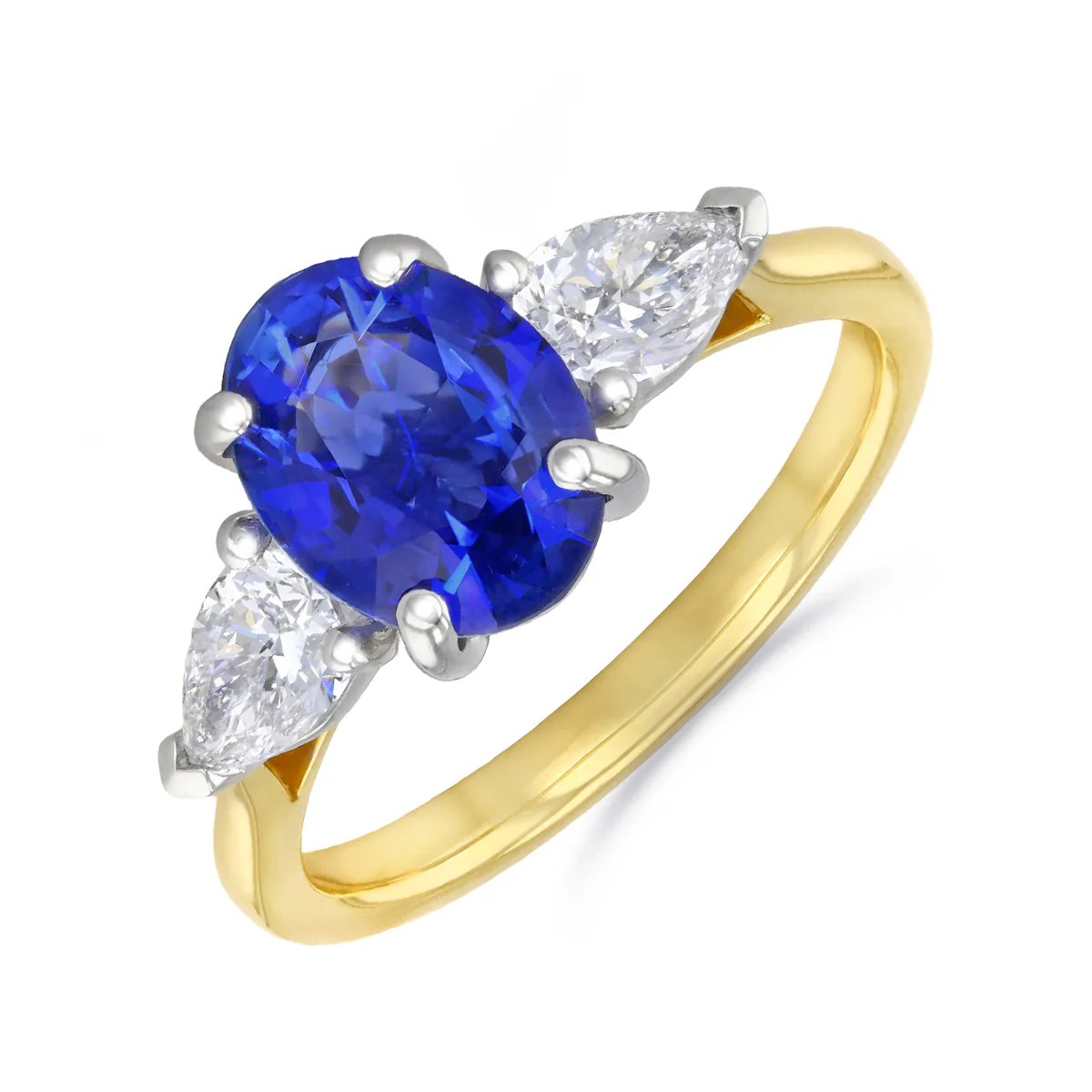 Heirloom Collection 2.13ct Oval Ceylon Sapphire and 0.64ct Pear Cut Diamonds Three Stone Ring | 18K Yellow Gold