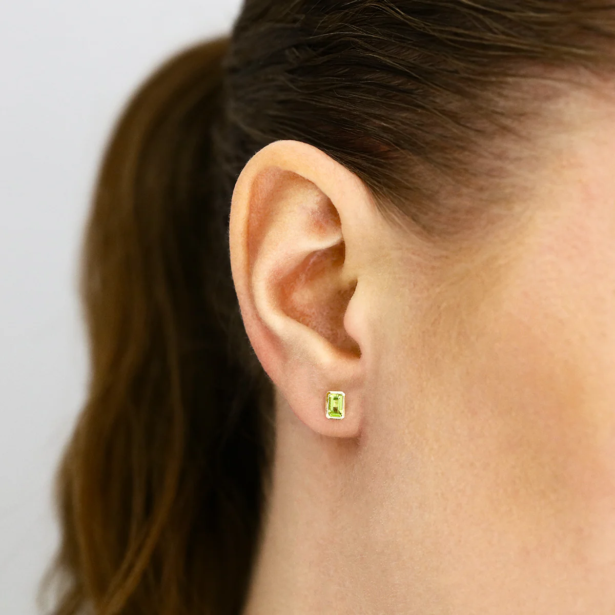 Birthstone Collection 0.56ct Emerald Cut Peridot  Bezel Set Earrings | 9K Yellow Gold - Image 5
