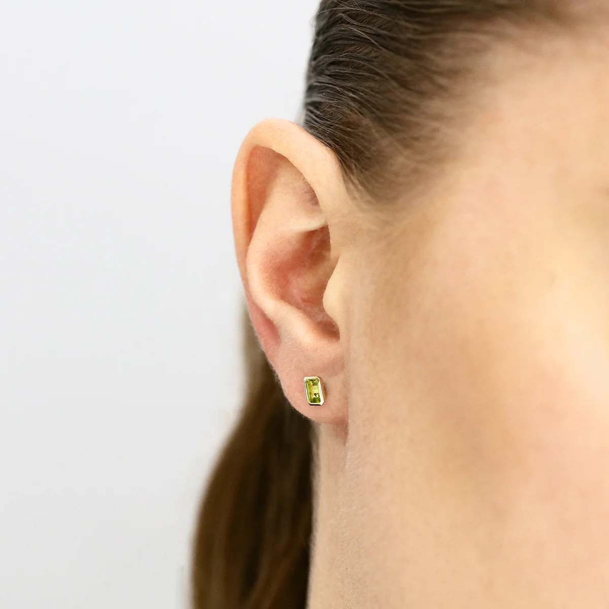 Birthstone Collection 0.56ct Emerald Cut Peridot  Bezel Set Earrings | 9K Yellow Gold - Image 6