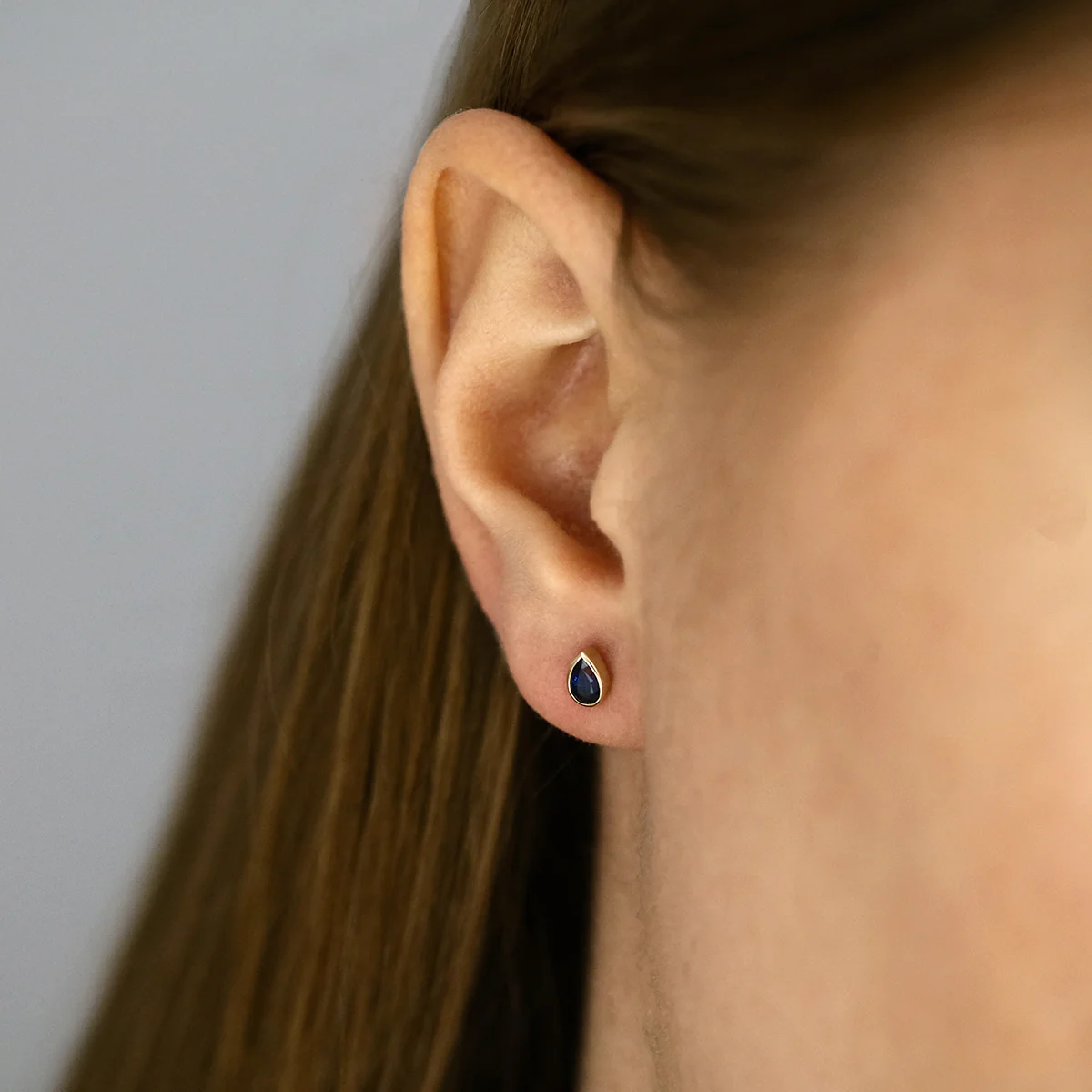 Birthstone Collection 0.56ct Pear Cut Blue Sapphire Stud Earrings | 9K Yellow Gold - Image 5