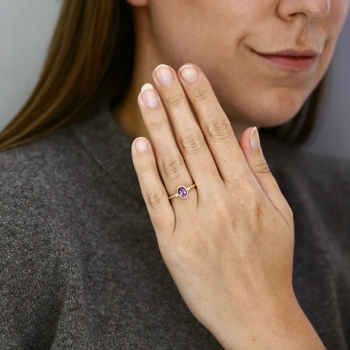 Heirloom Collection Oval Pink Sapphire and 0.05ct Diamond Bezel Set Three Stone Ring | 9K Yellow Gold - Image 6