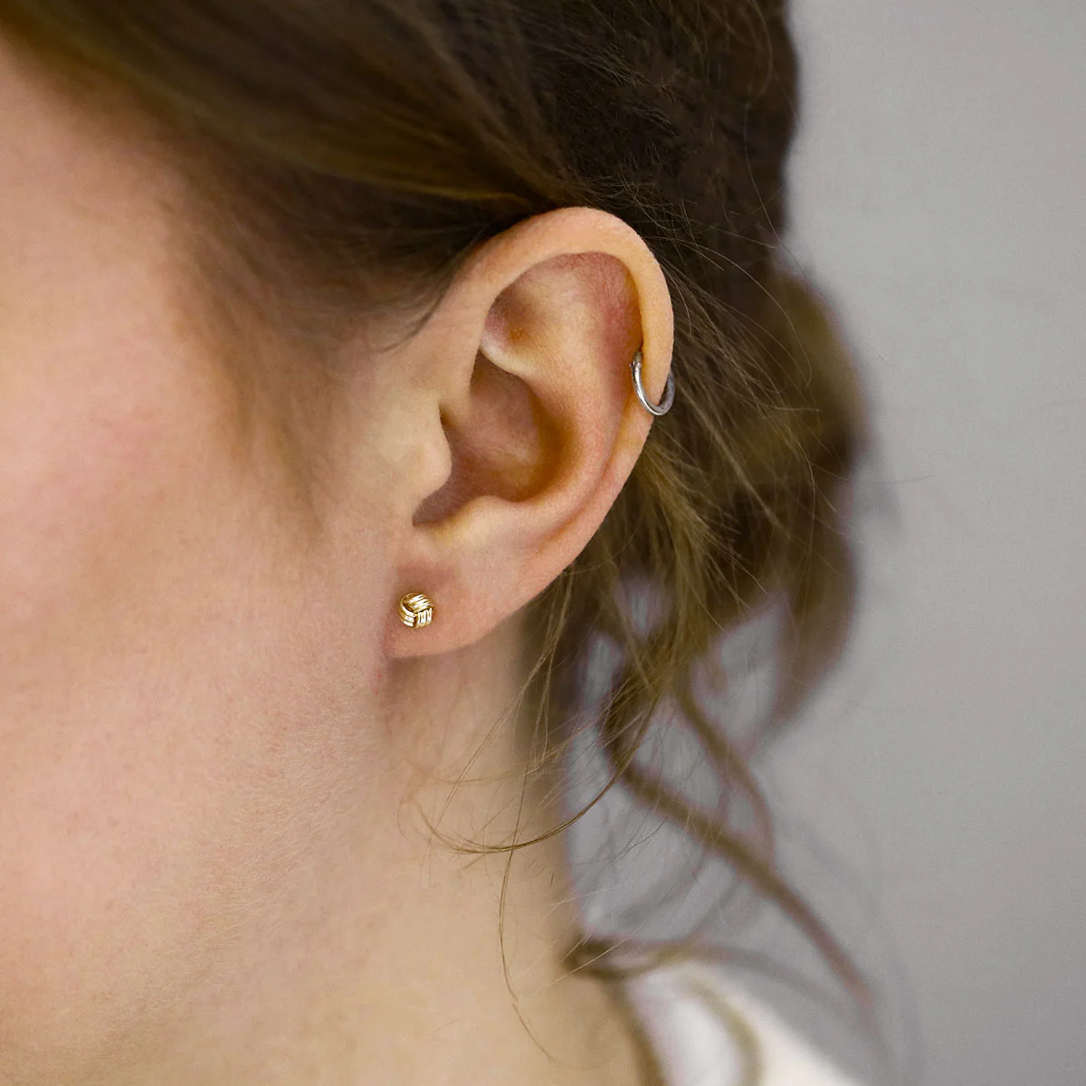 Soleil Collection 5mm Ribbed Knot Stud Earrings | 9K Yellow Gold - Image 6
