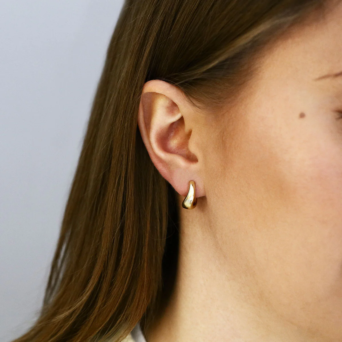 Soleil Collection Wavy Half Hoop Earrings | 9K Yellow Gold - Image 5