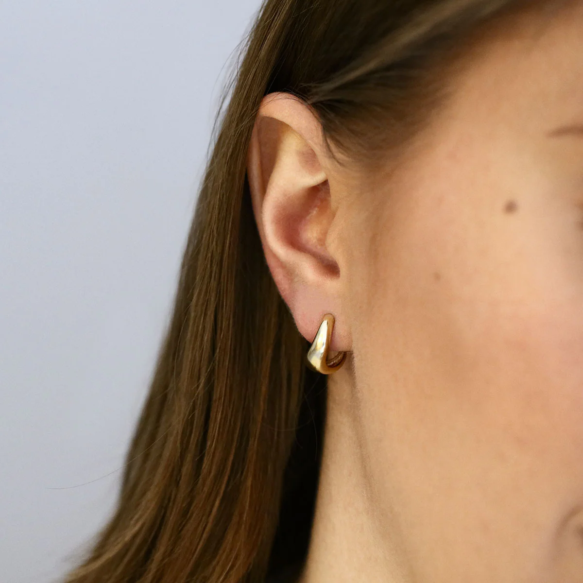 Soleil Collection Wavy Half Hoop Earrings | 9K Yellow Gold - Image 6